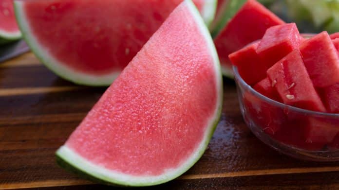 A,View,Of,A,Large,Slice,Of,Watermelon,Next,To
